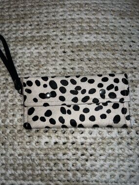 Beaudin cow hide wristlet euc